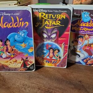 Disney Aladdin VHS Set with Purple and Red Covers